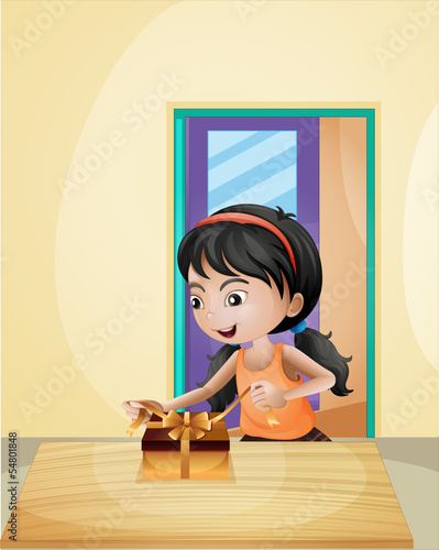 A girl unwrapping a gift