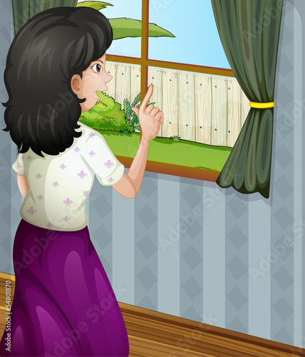 A mother facing the window