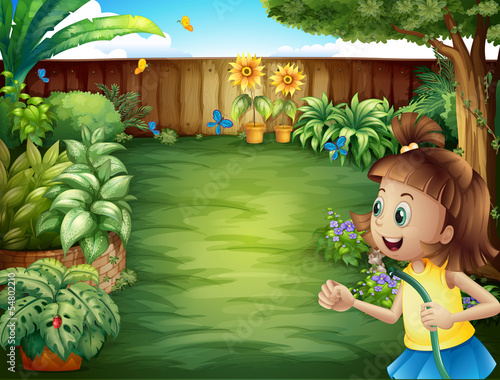A girl holding a water hose