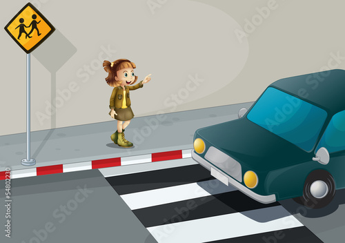 A girl pointing at the car near the pedestrian lane