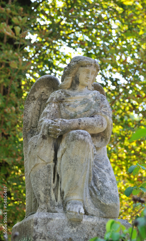 Old statue in Lychakiv Cemetery in Lviv, Ukraine