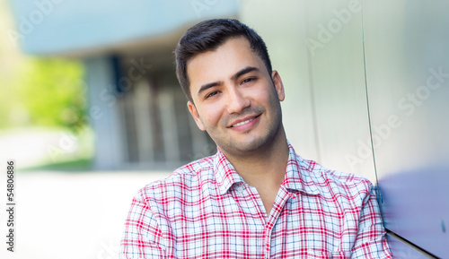 Valokuva Portrait of a smiling young man