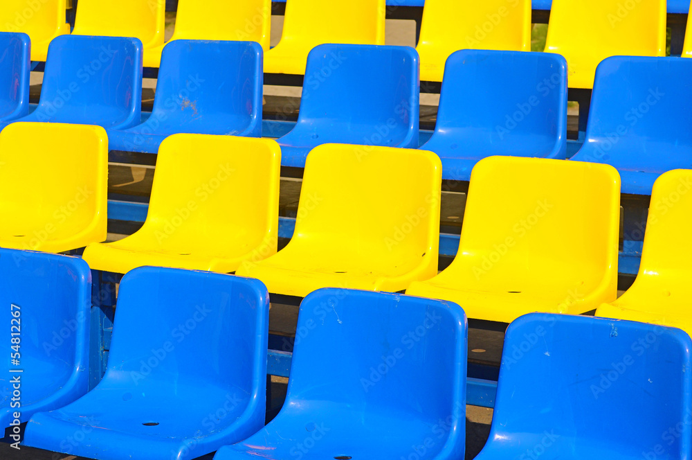 Empty plastic seats in a stadium Empty plastic seats in a stadium