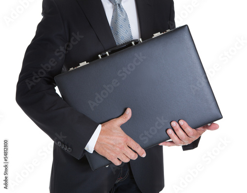 Close-up Of Businessman Holding Briefcase