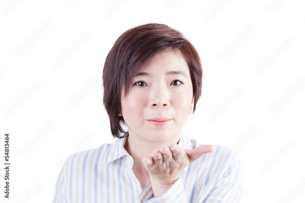 beautiful asian woman blowing out of mouth beautiful asian woman blowing out of mouth