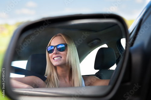 Young Woman Driving Car © Andrey Popov