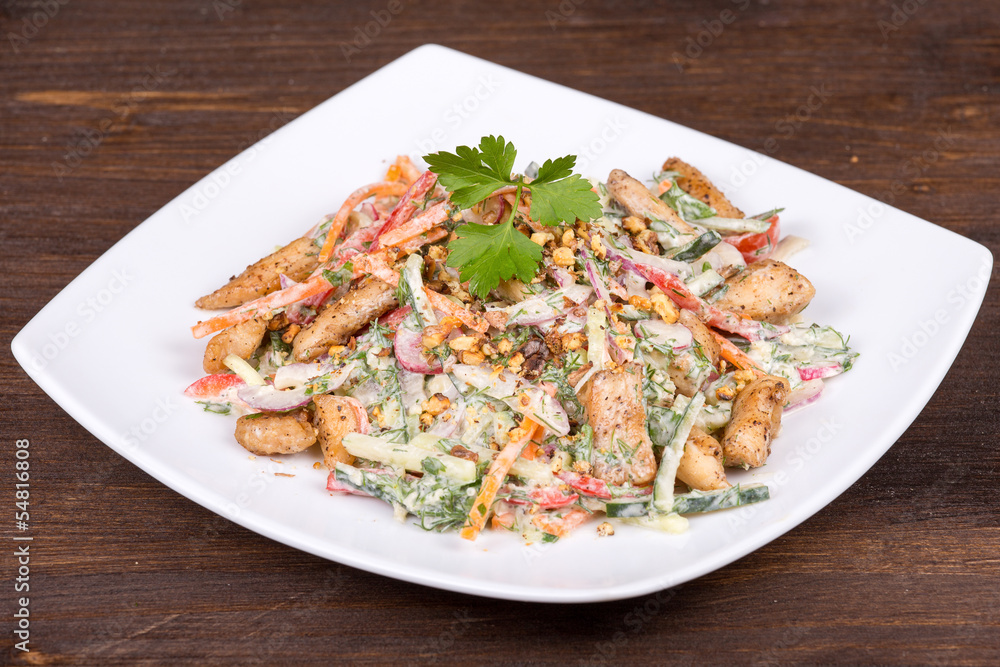 Vegetable salad with chicken in cream sauce Vegetable salad with chicken in cream sauce