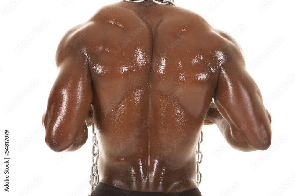 Fototapeta premium Strong man with chain back close