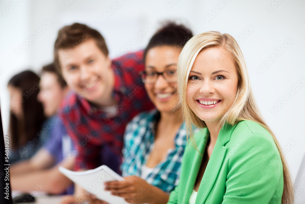 Obraz premium students with computer studying at school