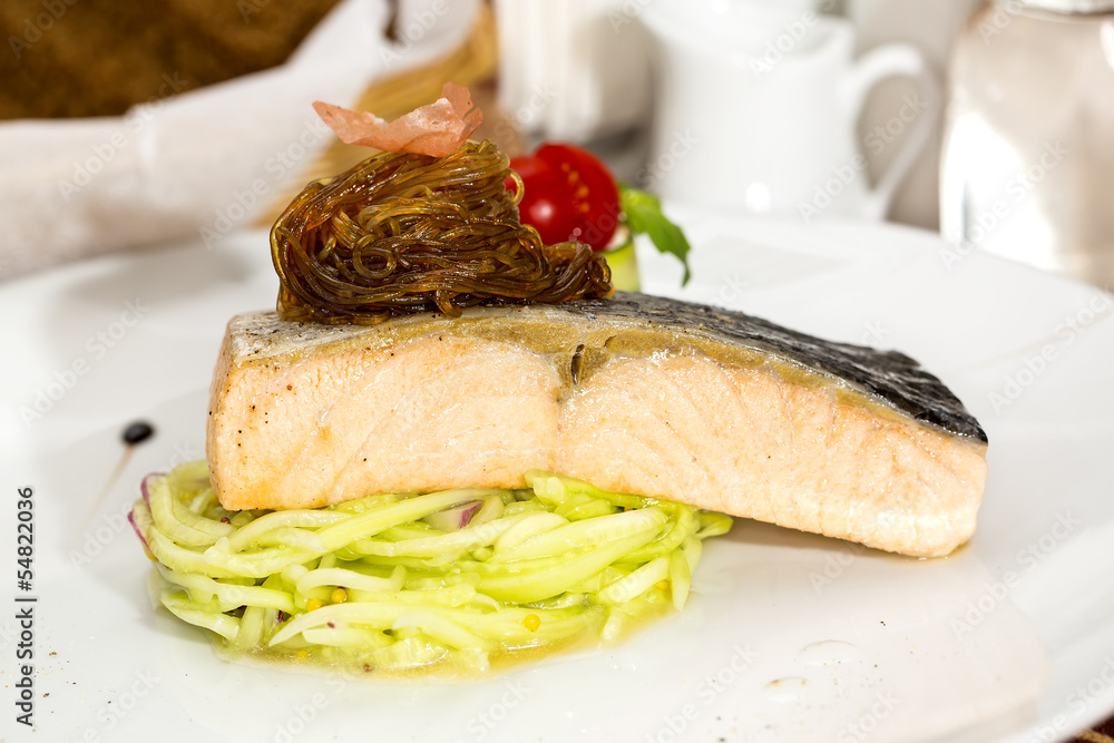 salmon fillet with vegetables in a restaurant