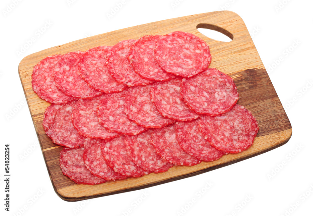 tasty sausage on wooden cutting board, isolated on white