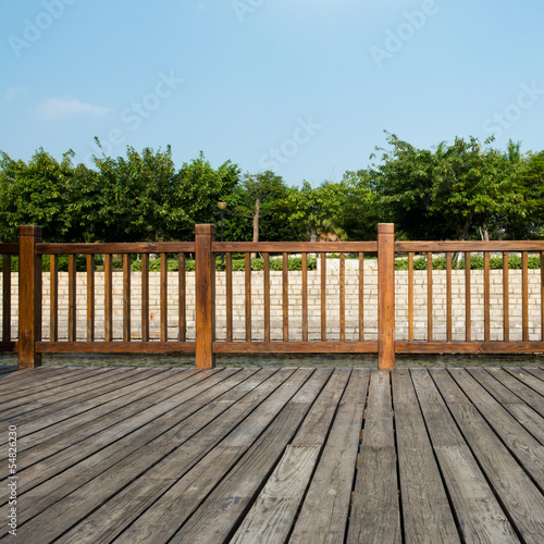 Blue sky and wood floor