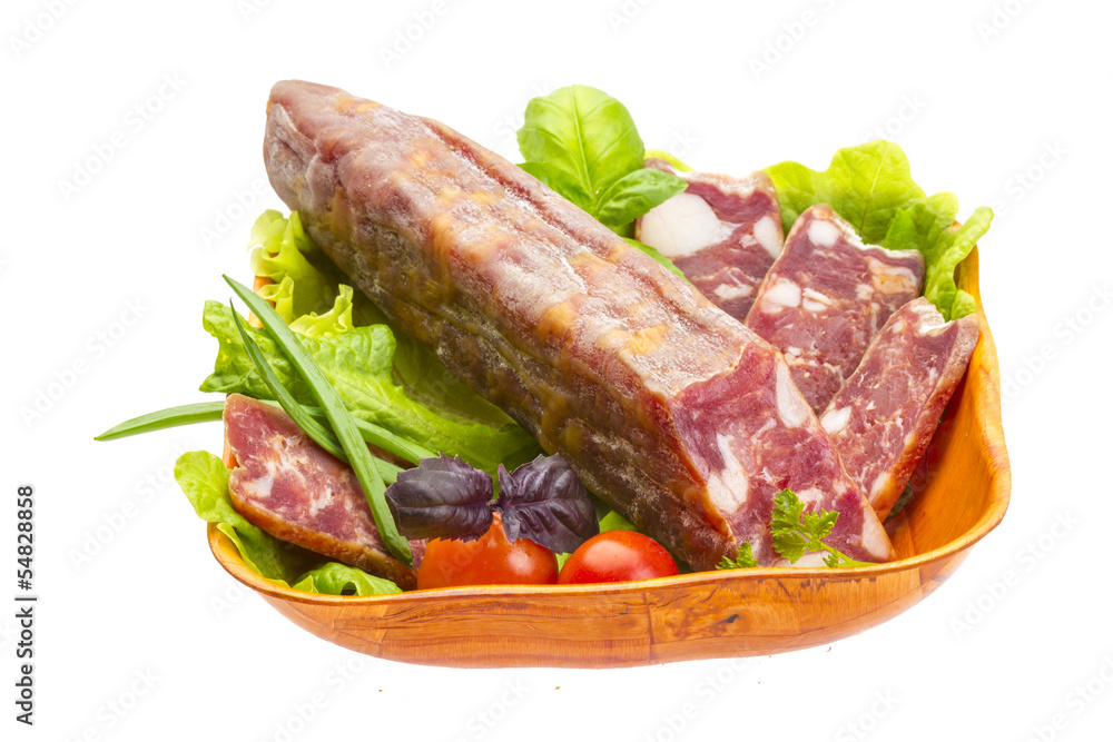 Ripe salami with salad, basil, onion and tomato Ripe salami with salad, basil, onion and tomato