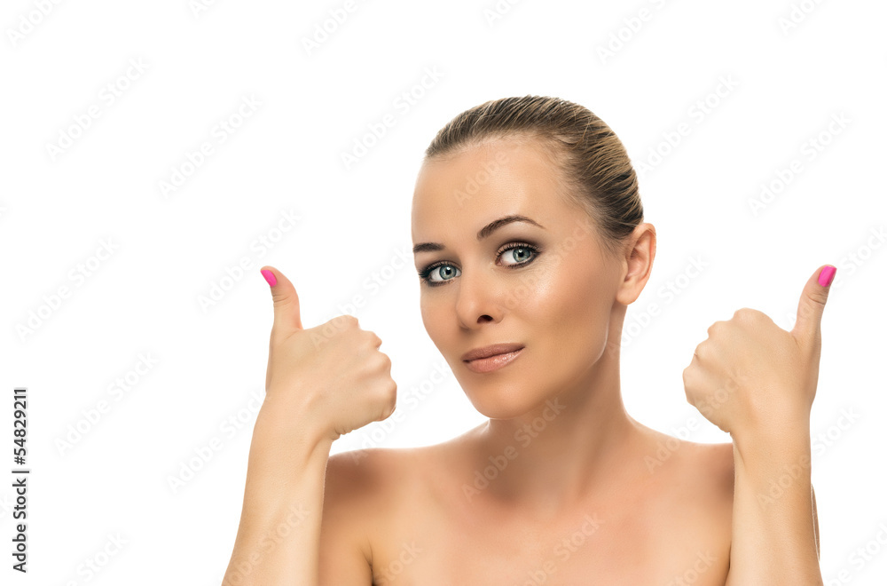 Close-up of a young woman showing thumbs up Close-up of a young woman showing thumbs up