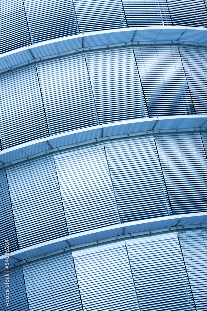 Fototapeta premium Office building with many windows and metal blinds