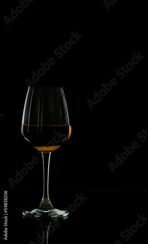 Wine glass in blackdrop