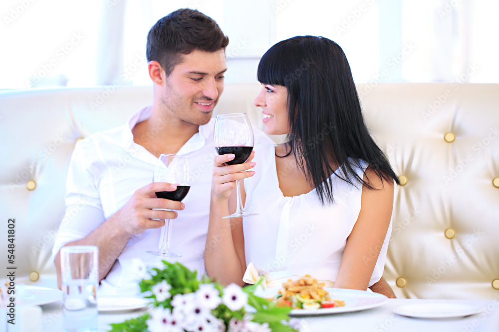 Beautiful couple having romantic dinner at restaurant Beautiful couple having romantic dinner at restaurant