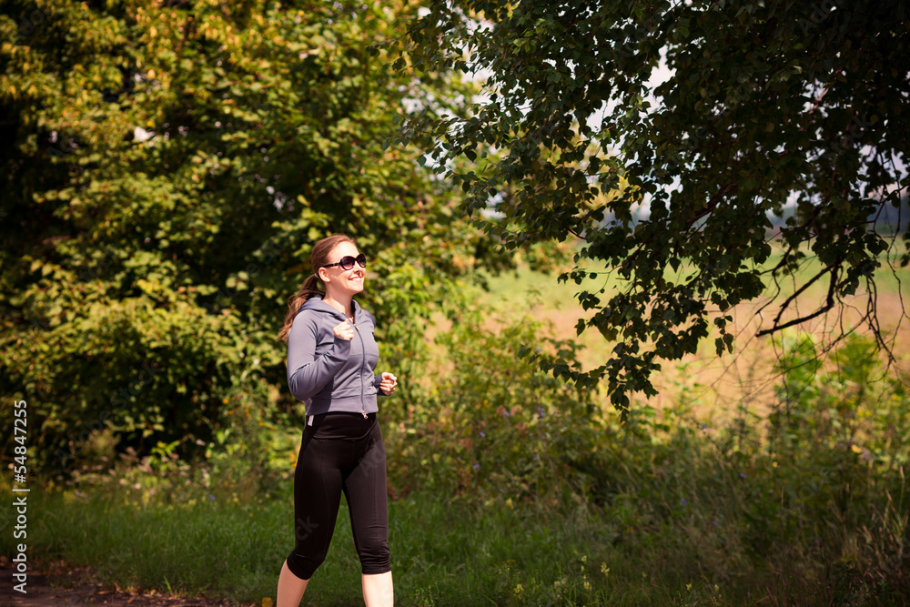 Runner woman jogging in nature outdoor Runner woman jogging in nature outdoor