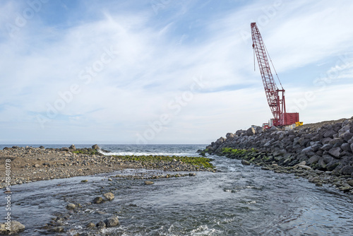 Work in progress protecting a small harbor in the Azores