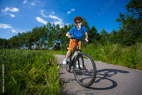 Healthy lifestyle - teenage boy biking