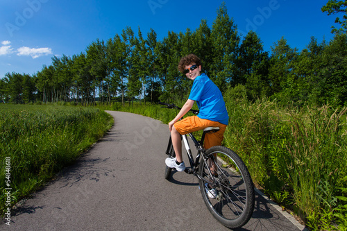 Healthy lifestyle - teenage boy biking