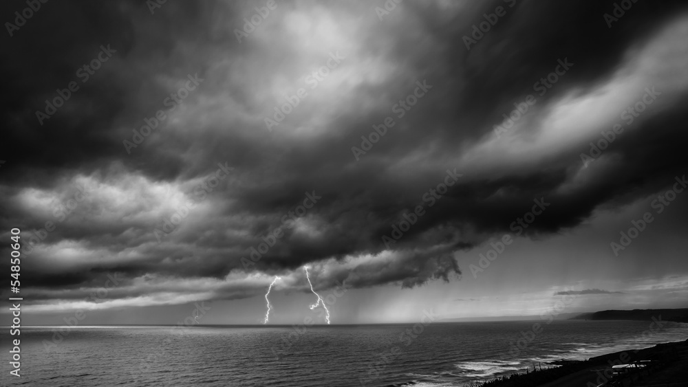 Fototapeta Lightning Storm Over Sea - black and white