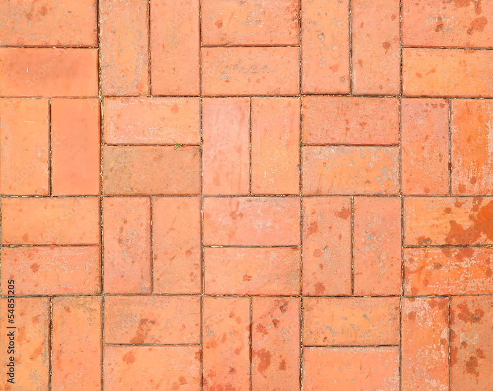 Red brick paving stones on a sidewalk Red brick paving stones on a sidewalk