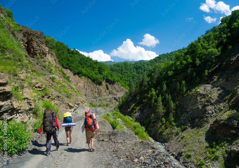 Fototapeta premium Young hikers trekking in Svaneti,