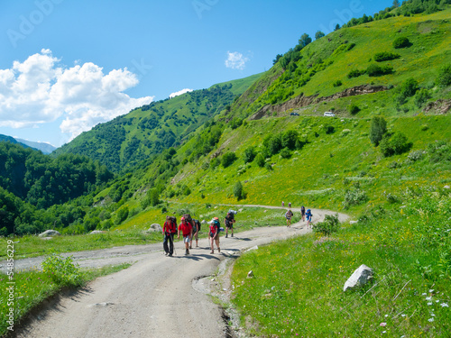 Young hikers trekking in Svaneti, photo