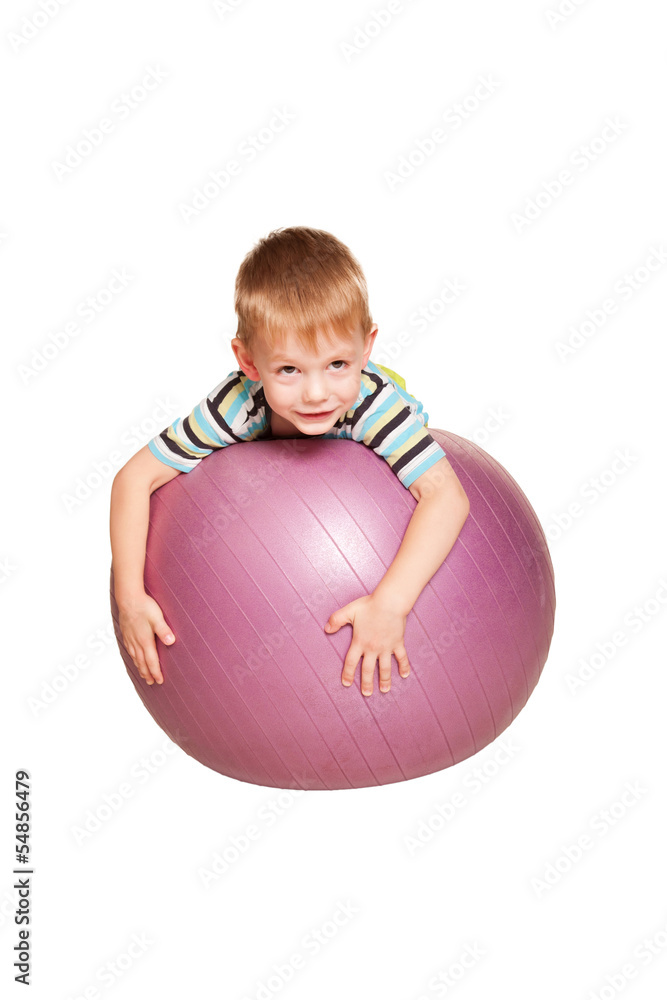 Happy little boy with fitness ball. Happy little boy with fitness ball.