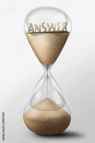 Hourglass with Answer made of sand. Concept of uncertainty