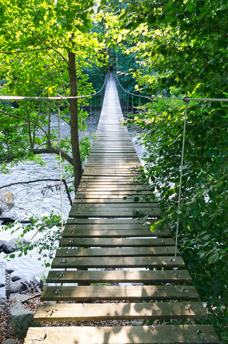 Fototapeta Naklejka Na Ścianę i Meble -  Swedish suspension bridge over Morrum river