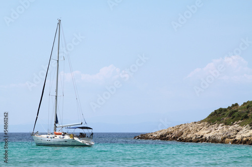 sailing boat anchored in a bay © kanvag