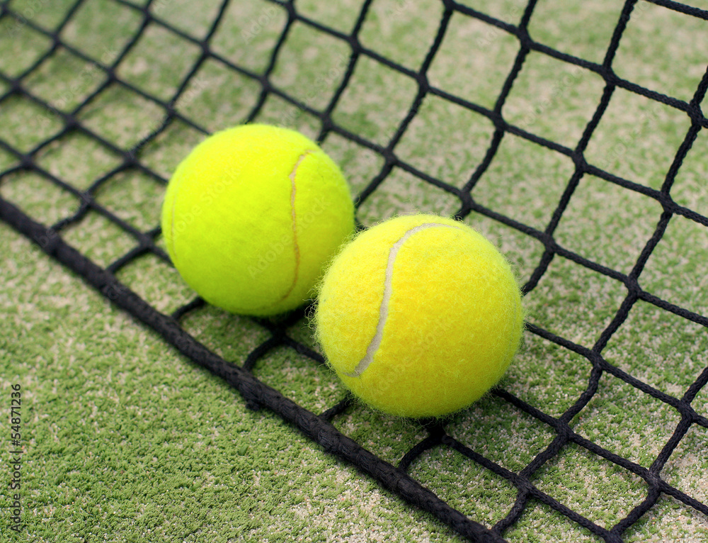 tennis balls on the net.