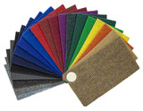 Multi-colored carpeting samples by a fan