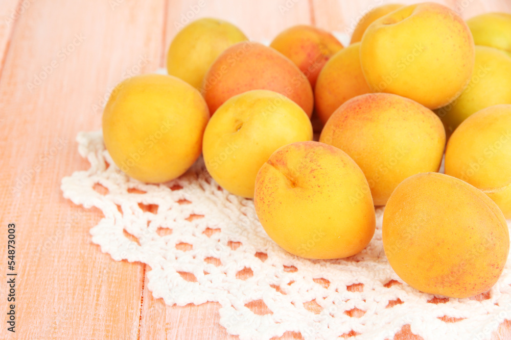 Fresh natural apricot on wooden table