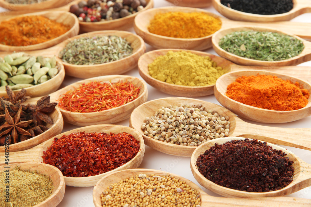 Fototapeta premium Assortment of spices in wooden spoons