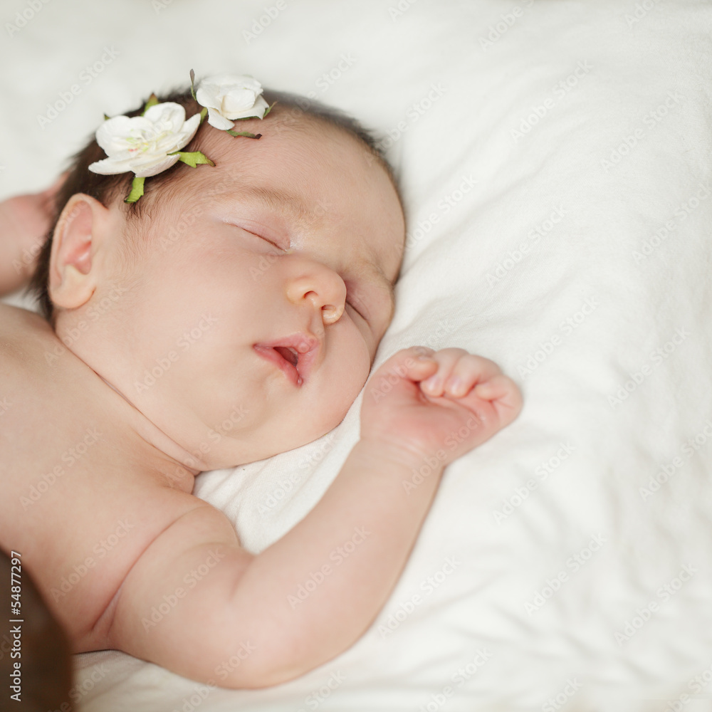 Cute sleeping baby on white