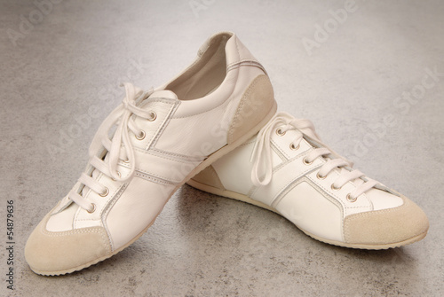 pair of white gym-shoes