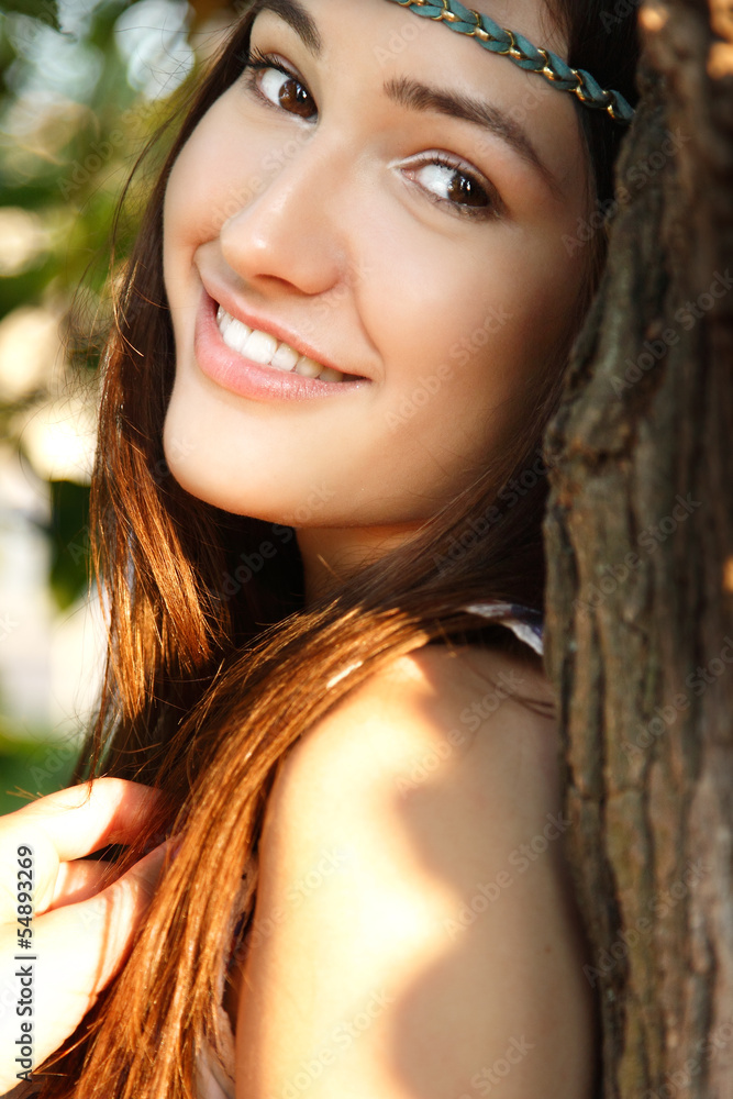 portrait of beautiful young girl near tree portrait of beautiful young girl near tree