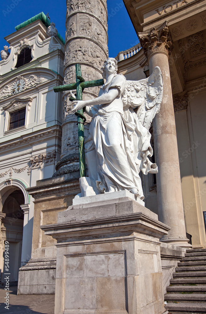 Obraz premium Statue of an angel in St. Charles Church. Vienna, Austria