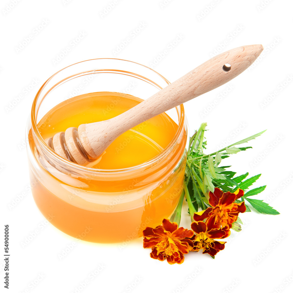 pot with honey and drizzler isolation on a white background pot with honey and drizzler isolation on a white background