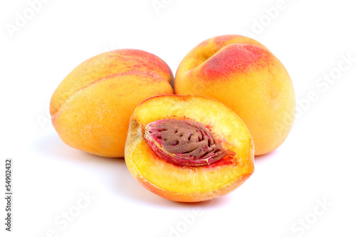 Juicy peaches on white