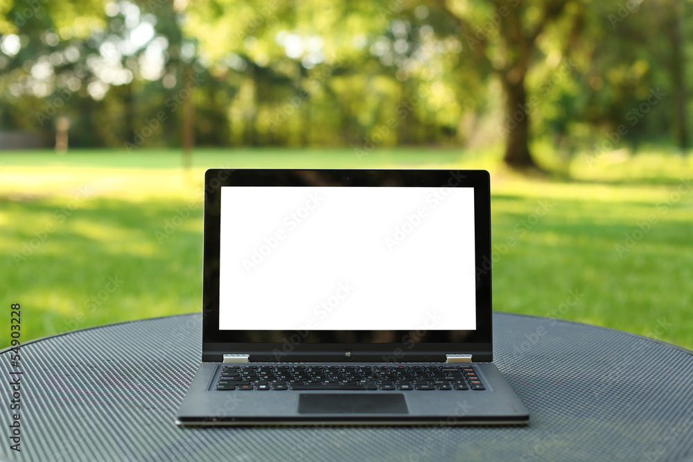 Laptop with blank screen outdoors Laptop with blank screen outdoors