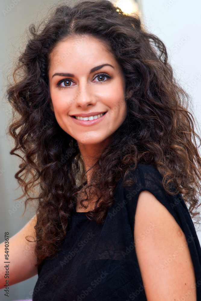 attractive woman with curly hair attractive woman with curly hair