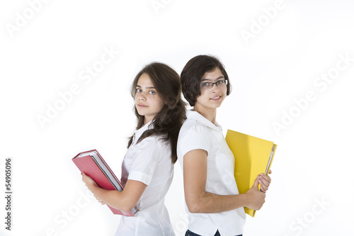 Students back to back holding heavy books