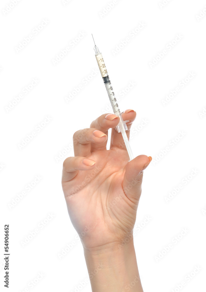 hand with medical insulin syringe in hand hand with medical insulin syringe in hand