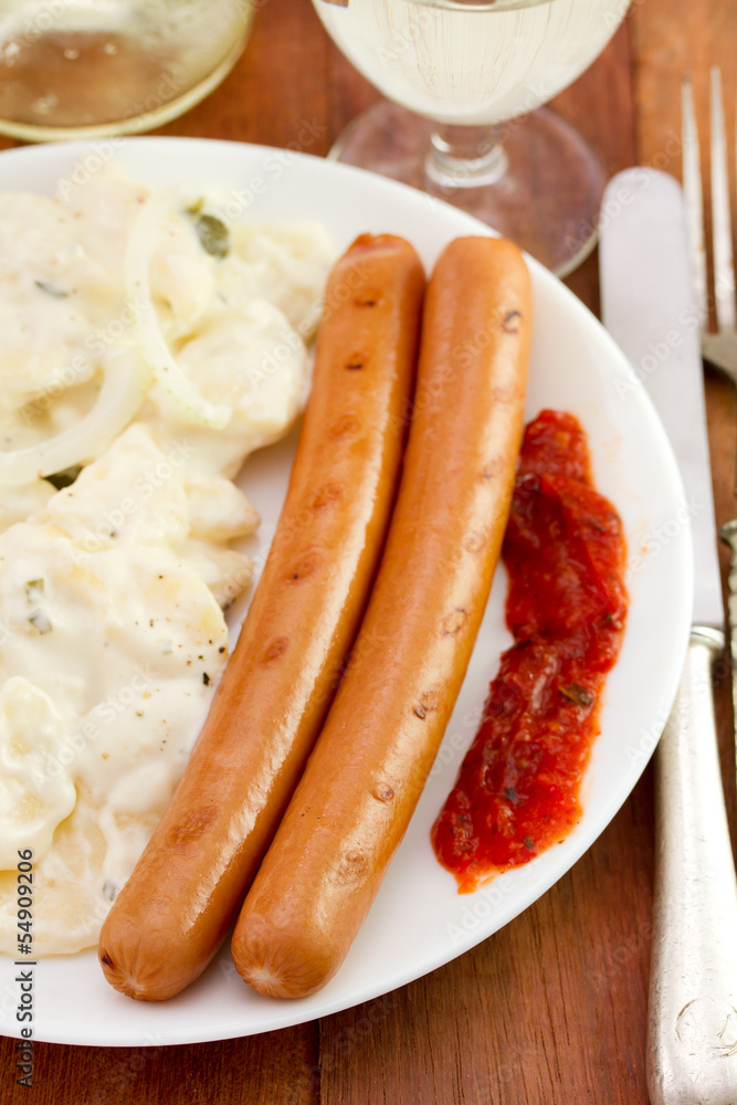 grilled sausages with sauce and salad grilled sausages with sauce and salad