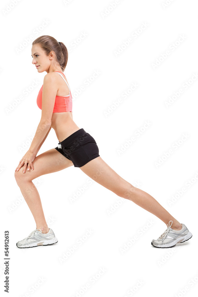 attraktive sportliche junge frau macht fittness sport isoliert attraktive sportliche junge frau macht fittness sport isoliert