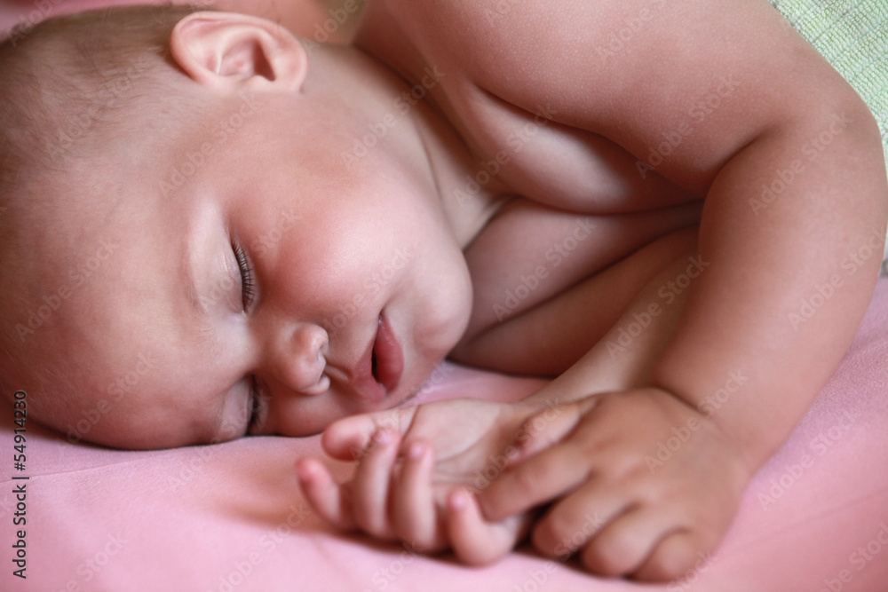 Sleeping Caucasian baby closeup portrait